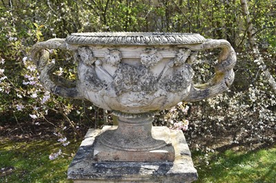 Lot 49 - A large and impressive 19th century ceramic urn, modelled as the Warwick vase, on a pedestal (2)