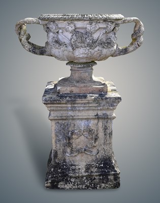 49 - A large and impressive 19th century ceramic urn, modelled as the Warwick vase, on a pedestal (2)