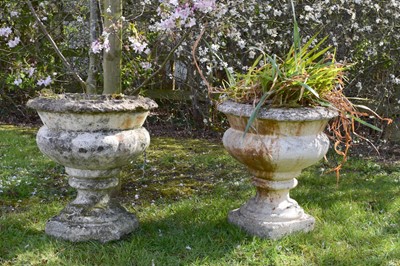 Lot 40 - A pair of 19th/20th century composition stone baluster-form urns