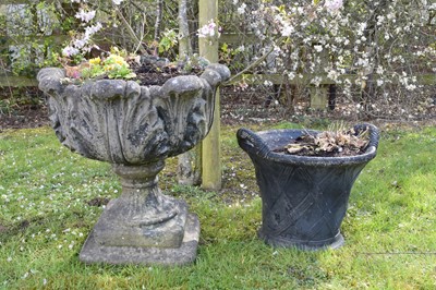 Lot 715 - A composition twin-handled, basket-form planter, with an acanthus form urn (2)