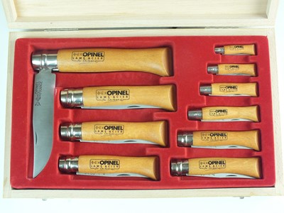 Lot 216 - A cased set of ten non-locking folding Opinel...