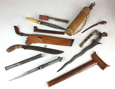 Lot 201 - A collection of South East Asian daggers and weapons