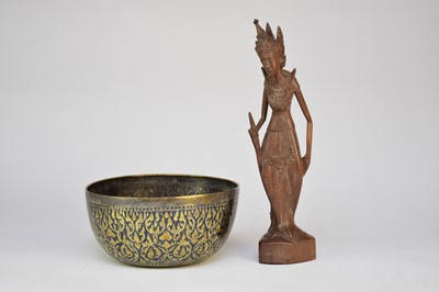 Lot 214 - A Sumatra silver niello bowl and Balinese wood figure