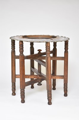 Lot 490 - A central Asian silver dish on folding stand