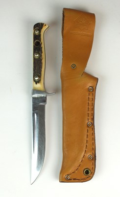 Lot 225 - A Puma "Trail Guide" knife with stag handle