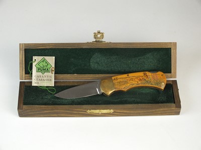 Lot 226 - A limited-edition Puma 4-Star 715 scrimshaw knife