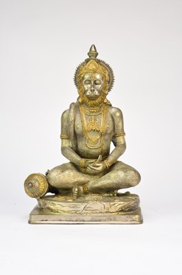 Lot 223 - An Indian parcel gilt white metal figure of Hanuman