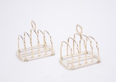Lot 10 - A pair of four division silver toast racks