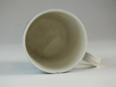 Lot 124 - A Caughley 'Fisherman' mug, circa 1780-90