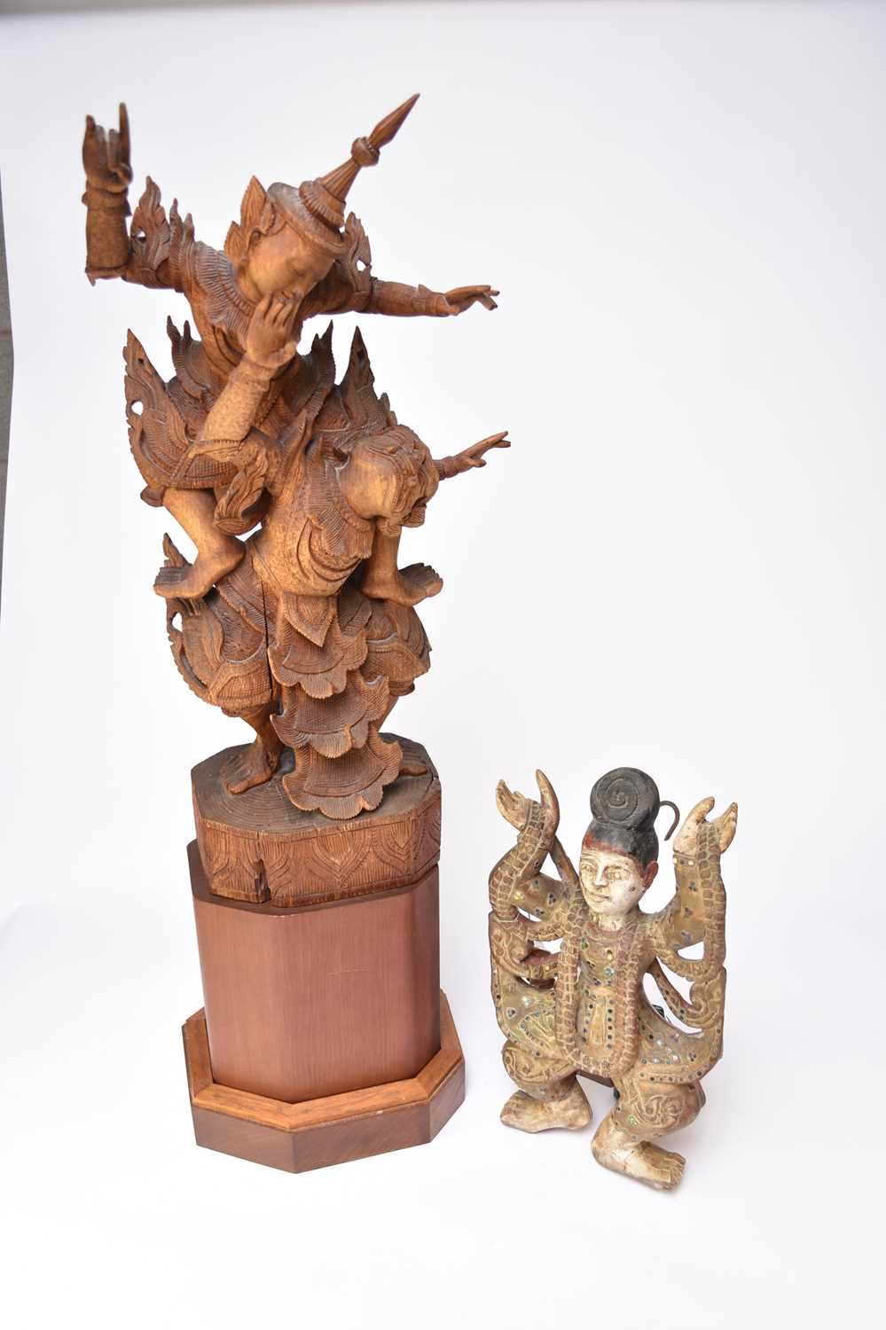 Lot 486 - A South-East Asian carving of Hannuman and Rama, 69.5cm high