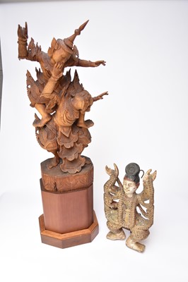 Lot 486 - A South-East Asian carving of Hannuman and Rama, 69.5cm high