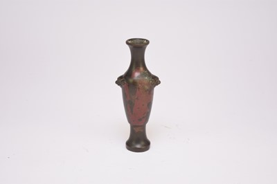 Lot 141 - A small Chinese lacquered bronze vase, Qing Dynasty