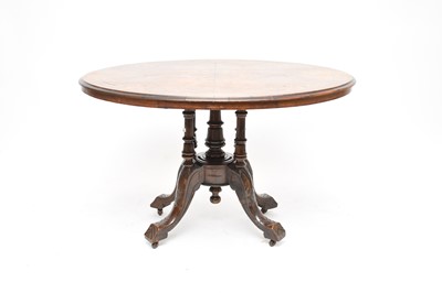 Lot 660 - A Victorian inlaid walnut and mahogany tilt-top centre table
