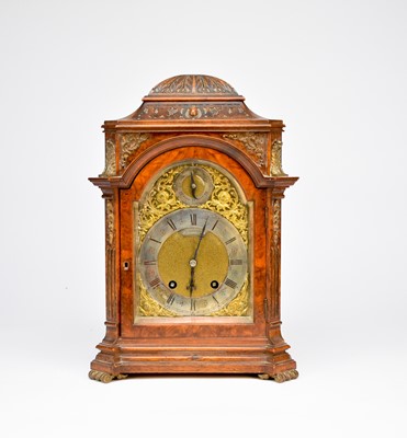 Lot 494 - A late 19th century walnut veneered mantel clock