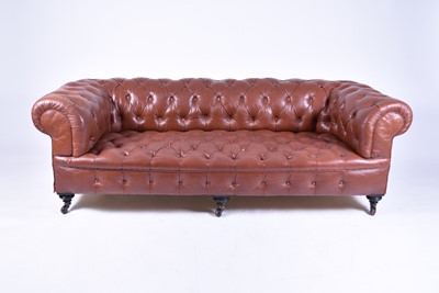 Lot 559 - A late Victorian hide covered, buttoned Chesterfield