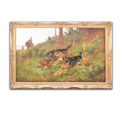 Lot 380 - Arthur Wardle (British, 1864-1949), Two bloodhounds on the scent, oil, 77 x 128cm