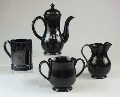 Lot 394 - A group of Jackfield black-glazed earthenware, circa 1750-80