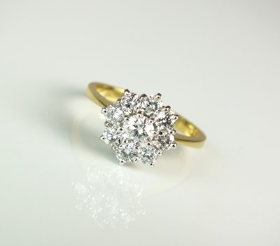 Lot 72 - An 18ct gold diamond floral cluster ring