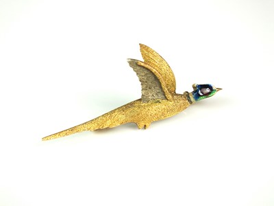 Lot 42 - A yellow metal and enamel pheasant bar brooch