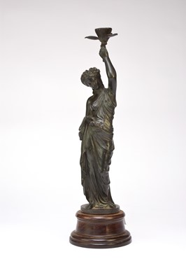 Lot 500 - A 19th century Bronze figural candle holder