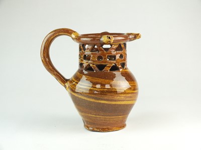 Lot 146 - Halifax slipware puzzle jug, 19th century