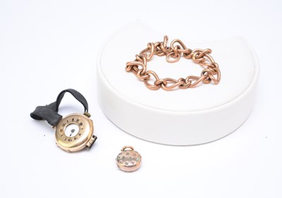 Lot 66 - A bracelet, locket and watch