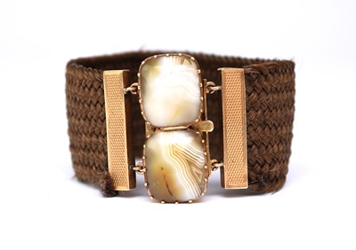Lot 67 - A 19th century plaited hair bracelet