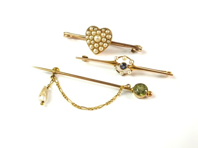 Lot 68 - Two brooches and a stick pin