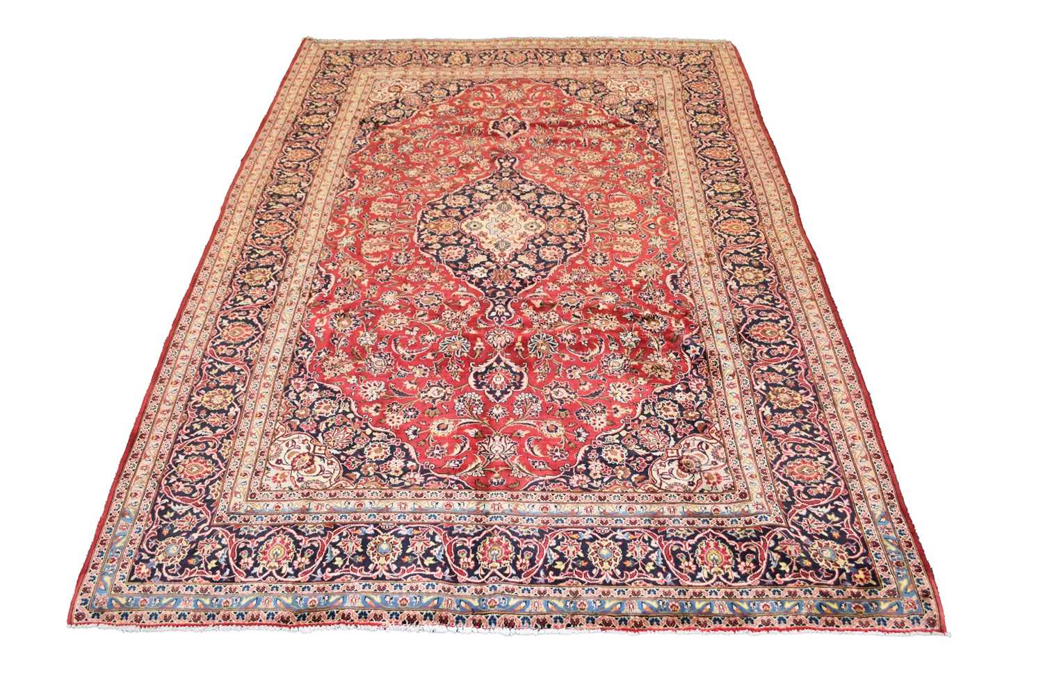 Lot 704 - A Kashan carpet, 20th century
