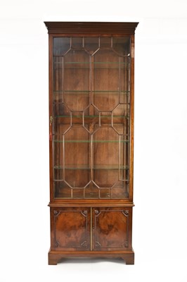 Lot 646 - A Regency style mahogany glazed diplay cabinet