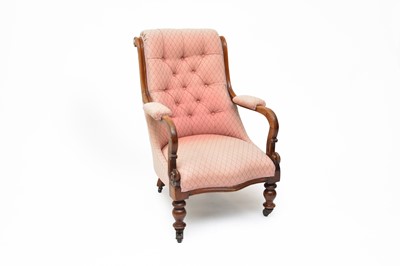 Lot 647 - A Victorian upholstered walnut button-back armchair