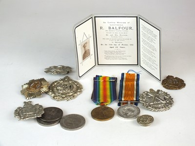 Lot 75 - First World War medal pair, Memorium card and group of assorted badges