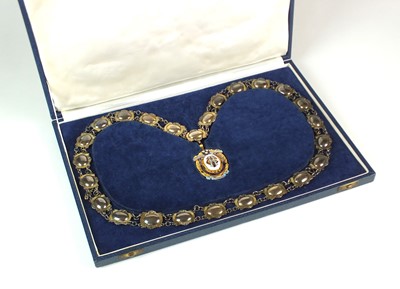 Lot 123 - A 9ct gold and enamelled United Commercial Travellers association jewel