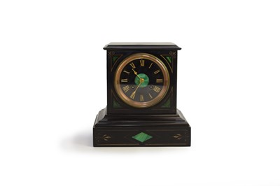 Lot 584 - A French black marble and malachite mantel clock