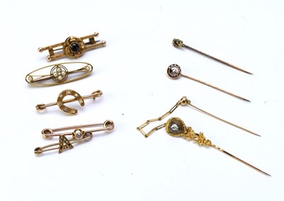 Lot 85 - A collection of five bar brooches and 3 stock pins