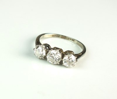 Lot 90 - A graduated three stone diamond ring