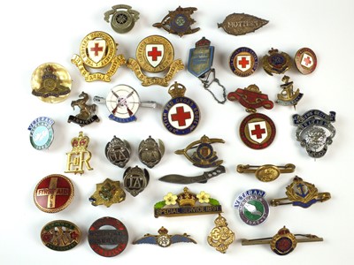 Lot 174 - Association and Veteran's lapel badges and sweetheart brooches, including Red Cross