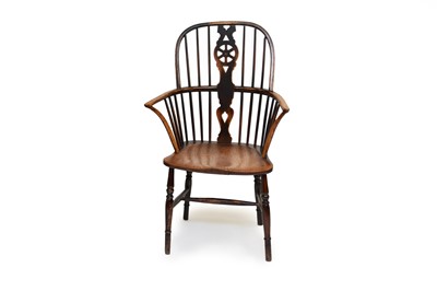 Lot 640 - A 19th century wheel back ash Windsor chair