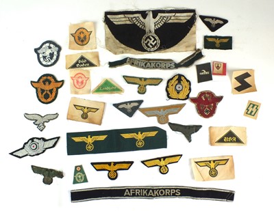 Lot 275 - A selection of assorted German Third Reich and later cloth insignia