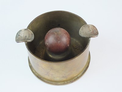 Lot 285 - Second World War German trench art ash tray and two rounds