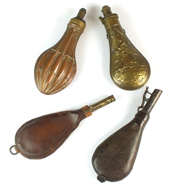 Lot 214 - Four shot and powder flasks, 19th century