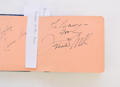 Lot 1107 - STAN LAUREL AND OLIVER HARDY autographs in an album.