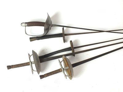Lot 91 - A group of five fencing foils, 19th century and 20th century