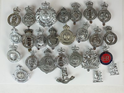 Lot 258 - A group of assorted British police cap badges,...