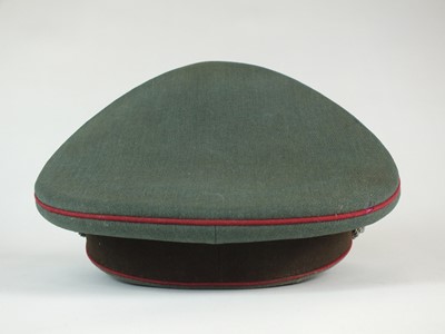 Lot 319 - A scarce German Third Reich Municipal Protection Police visor cap