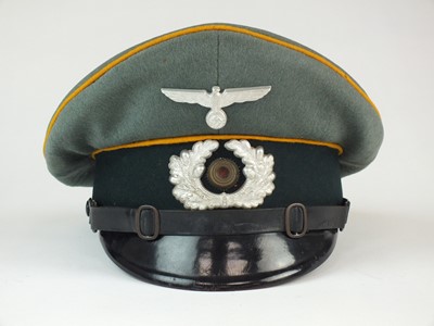 Lot 321 - German Army Cavalry NCO's visor cap by Erel