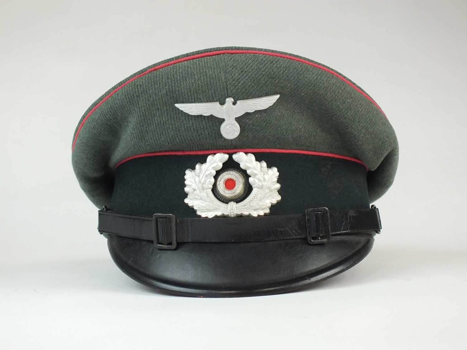 Lot 323 - German Army Panzer NCO's visor cap by Carl Halfar