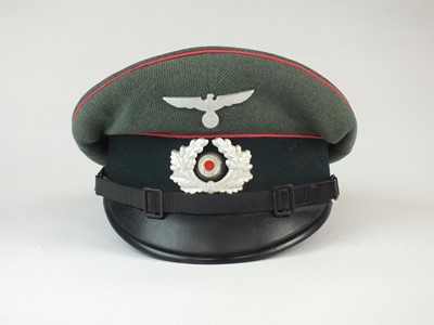 Lot 323 - German Army Panzer NCO's visor cap by Carl Halfar