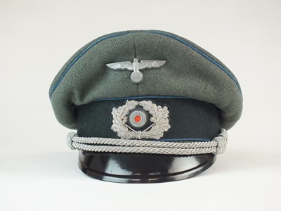 Lot 325 - German Truppensonderdienst Officer's visor cap by Otto Dittman