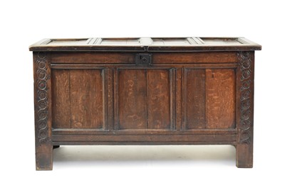 Lot 667 - A 17th century carved oak coffer